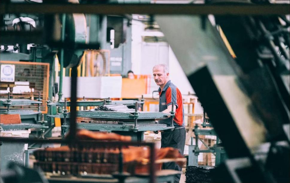 Operating machinery on a factory floor